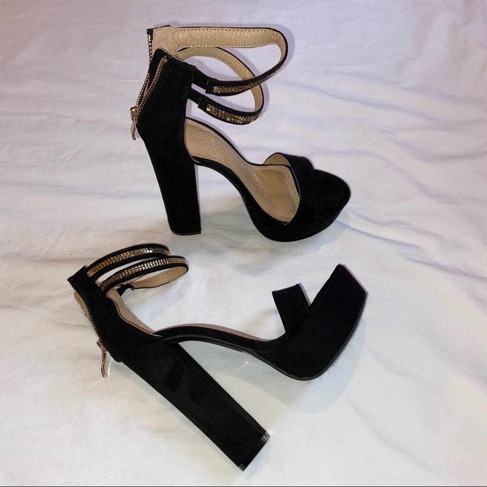 Black platform heels with gold design